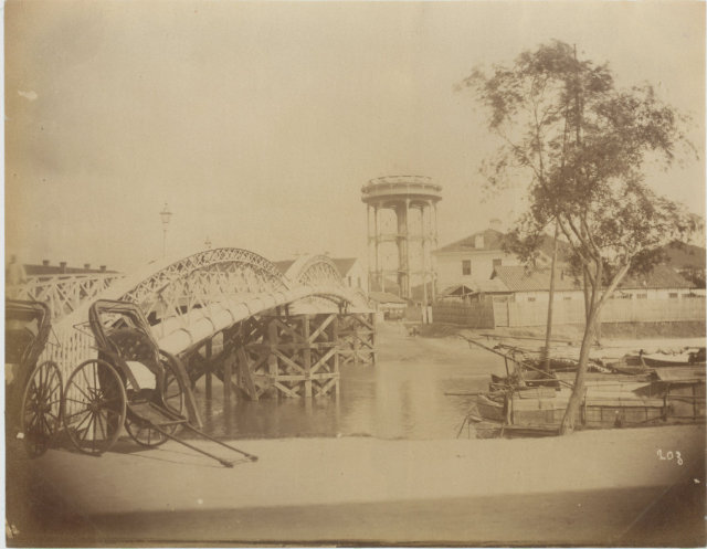 Bridge over Soochow Creek looking at the Water Tower, Shanghai, China. c1880